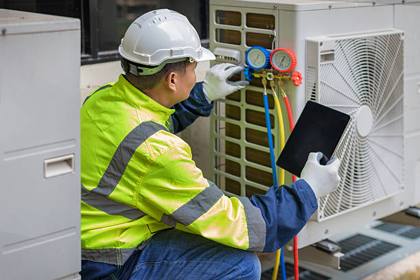 Professional Furnace Repair technician working in Wellesley Hills, MA